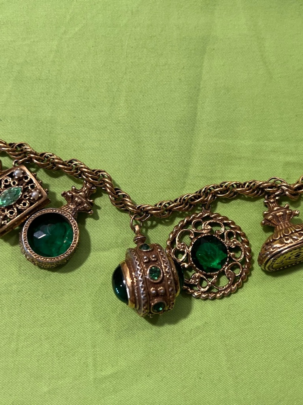 Gold-Tone Charm Bracelet with Emerald Green Glass Stones